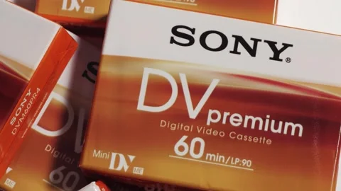 Sony DV Premium MiniDV Cassette Rotation Stock Footage 332911396
