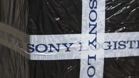 Sony electronics parcel package delivered preparing to unboxing Stock Footage 100588070