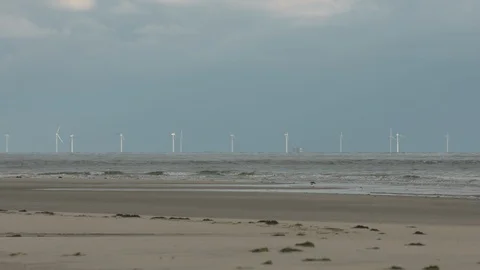 Sony fs7 245 5643 windmill park Wadden Sea North Sea Stock Footage 100372592