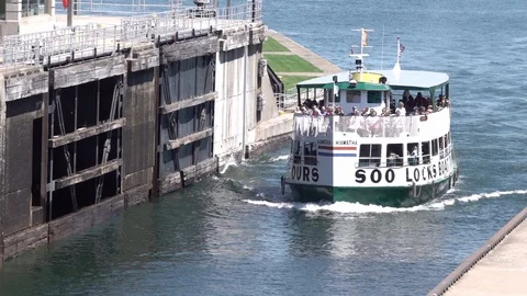 Soo Locks MI/USA August 2019: Soo Locks Tour Boat Haiwatha enters Soo Locks Stock Footage 123086027