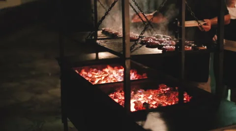Сook prepares sausages on the grill Vídeos de archivo 61075755