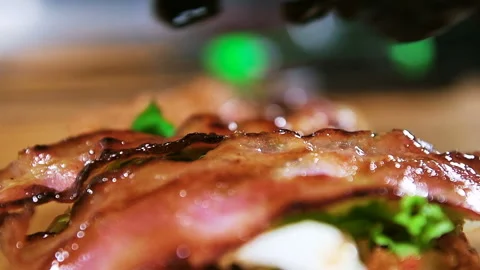 Сooking a Burger, fried bacon Stock Footage 101750841