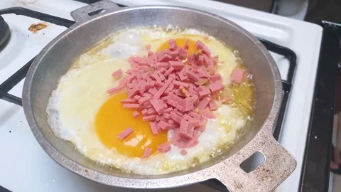 Сooking Fried Eggs For Breakfast, Stock Footage 254004137