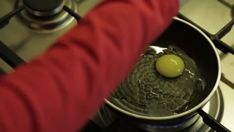 Сooking-scrambled-eggs-in-a-pan Stock Footage 144314758