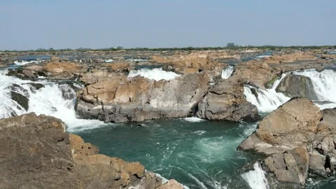 Sopheakmit or Preah Nimith waterfall with Cliffs and Green rapid in Mekong River Stock Footage 132850472