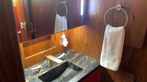 Sophisticated Bathroom Featuring Marble Sink And Soft Lighting Stock Footage 327920060
