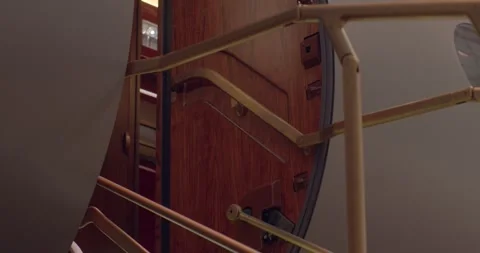 Sophisticated cabin step with warm lighting and refined staff service Vidéo 333892572