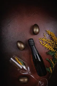 Sophisticated Easter setting with champagne and floral elements Stock Photos