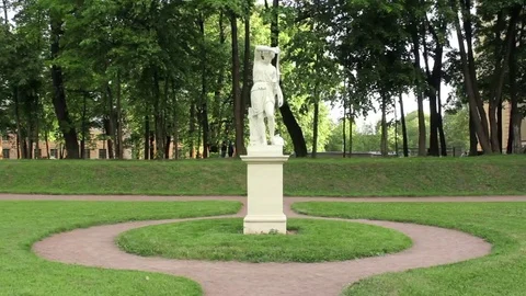 Sophisticated Marble Statue Surrounded by Pattern of Lawn Stock Footage 69090958