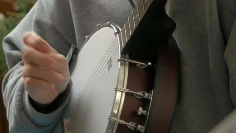 Sore fingers from learning banjo Stock Footage 141386148