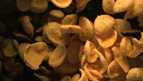 Сorn flakes falling from a height Stock Photos