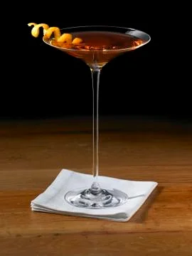 Sorriso Cocktail in a Stem Glass with Orange Peel Twist Garnish Stock Photos