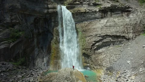Sorrosal Waterfall flowing into turquoise pool in Broto, Spain Stock Footage 341523780