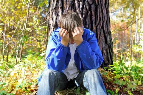Sorrowful young man Stock Photos