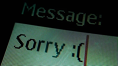 Sorry with Sad face Icon written on mobile screen Stock Footage 195113026