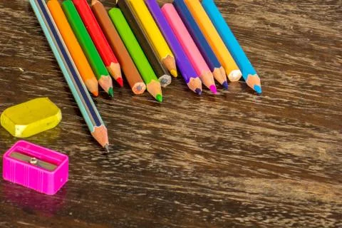 Sort crayons flooring surfaces, bright colors, red, yellow, black, orange and Stock Photos