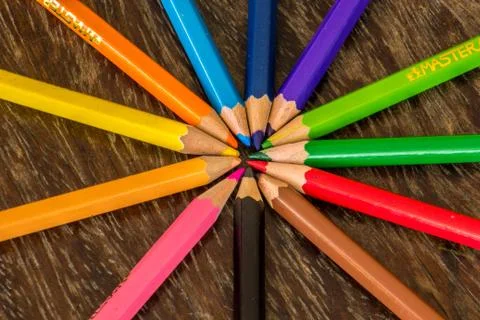 Sort crayons flooring surfaces, bright colors, red, yellow, black, orange and Stock Photos
