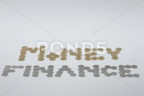 Sort gold and silver coins as money and finance Stock Photos