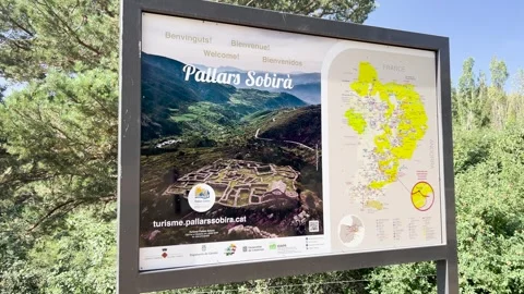 Sort, Spain; July 18 2026: Pallars Sobira welcome sign with area map in Lle.. Stock Footage 344148025