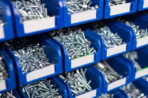 Sorted bolts in boxes in the store Foto stock