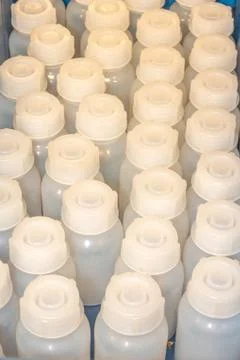 Sorted plastic sampling bottles in a box Stock Photos