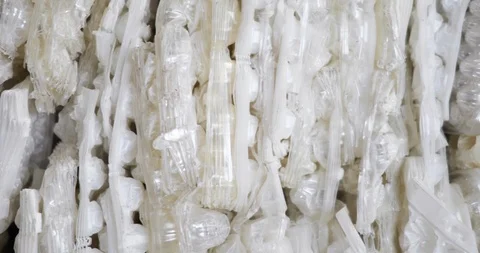 Sorted plastic waste egg packaging recyclable materials in processing plant. Vídeos de archivo 120123318