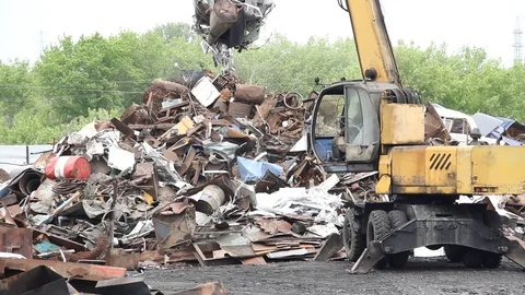 Sorting and loading of scrap metal. Stock Footage 76636318