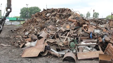 Sorting and loading of scrap metal. Stock Footage 76636340