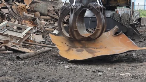 Sorting and loading of scrap metal. Stock Footage 76636348