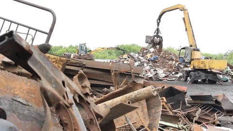 Sorting and loading of scrap metal. Stock Footage 76636356