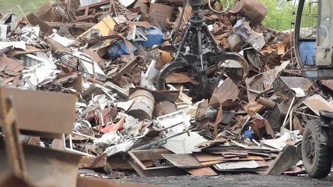Sorting and loading of scrap metal. Stock Footage 76636383