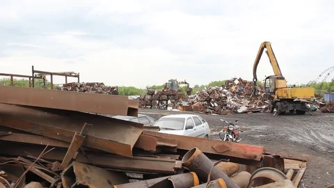 Sorting and loading of scrap metal. Stock Footage 76636455