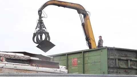 Sorting and loading of scrap metal. Stock Footage 76636485