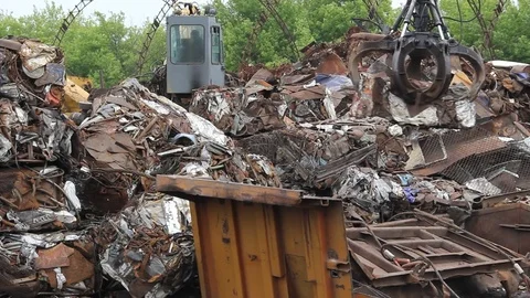 Sorting and loading of scrap metal. Stock Footage 76636498