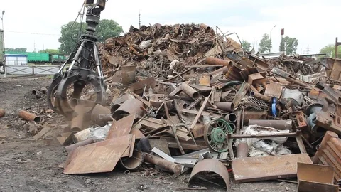 Sorting and loading of scrap metal. Stock Footage 76636503