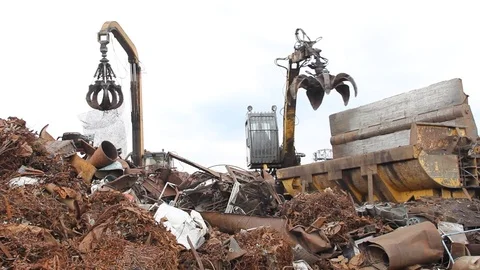 Sorting and loading of scrap metal. Stock Footage 76636507