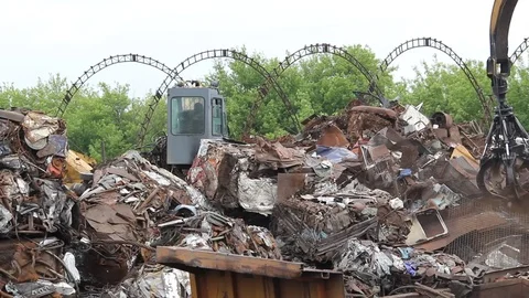 Sorting and loading of scrap metal. Stock Footage 76636923
