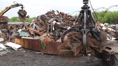 Sorting and loading of scrap metal. Stock Footage 76636943