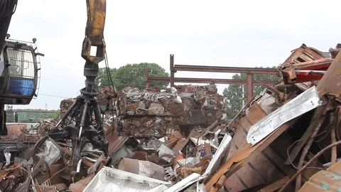 Sorting and loading of scrap metal. Stock Footage 76636946