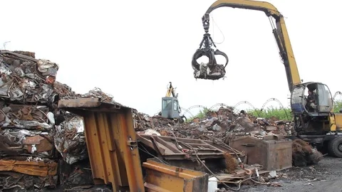Sorting and loading of scrap metal. Stock Footage 76636970