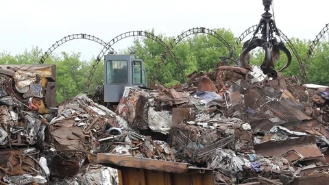 Sorting and loading of scrap metal. Stock Footage 76636974