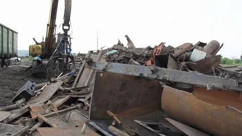 Sorting and loading of scrap metal. Stock Footage 76636981