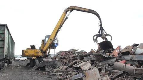 Sorting and loading of scrap metal. Stock Footage 76636999