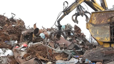 Sorting and loading of scrap metal. Stock Footage 76637001