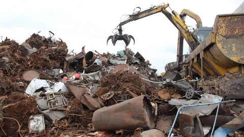 Sorting and loading of scrap metal. Stock Footage 76637017