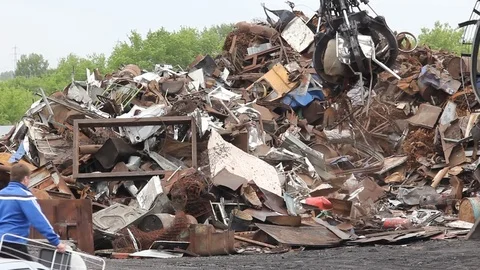 Sorting and loading of scrap metal. Stock Footage 76637022