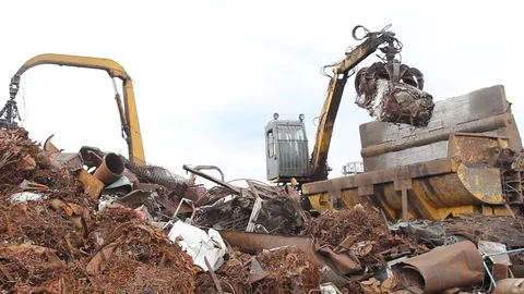 Sorting and loading of scrap metal. Stock Footage 76637027