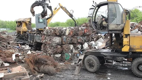 Sorting and loading of scrap metal. Stock Footage 76637112