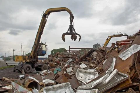 Sorting and loading of scrap metal. Stock Photos