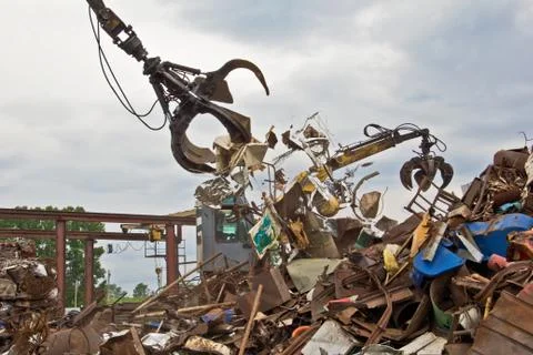 Sorting and loading of scrap metal. Stock Photos